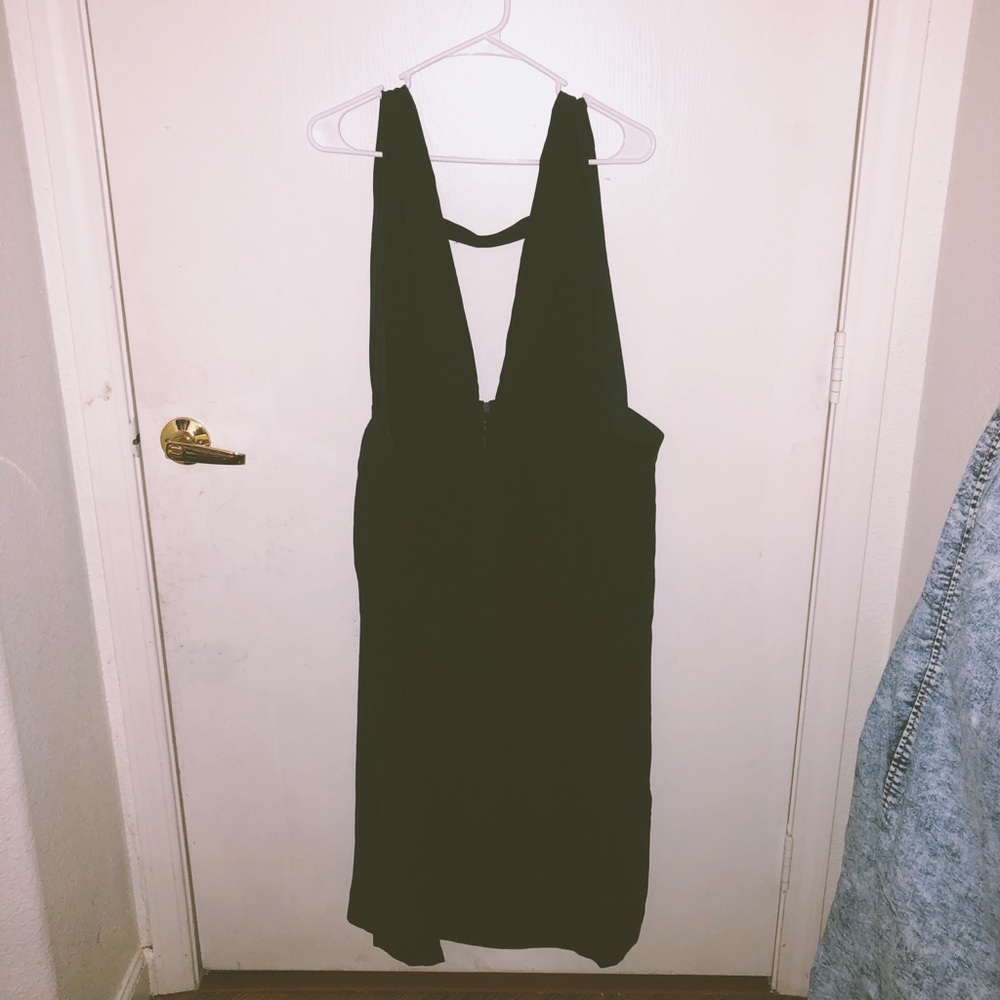 Dark green romper style kind dress